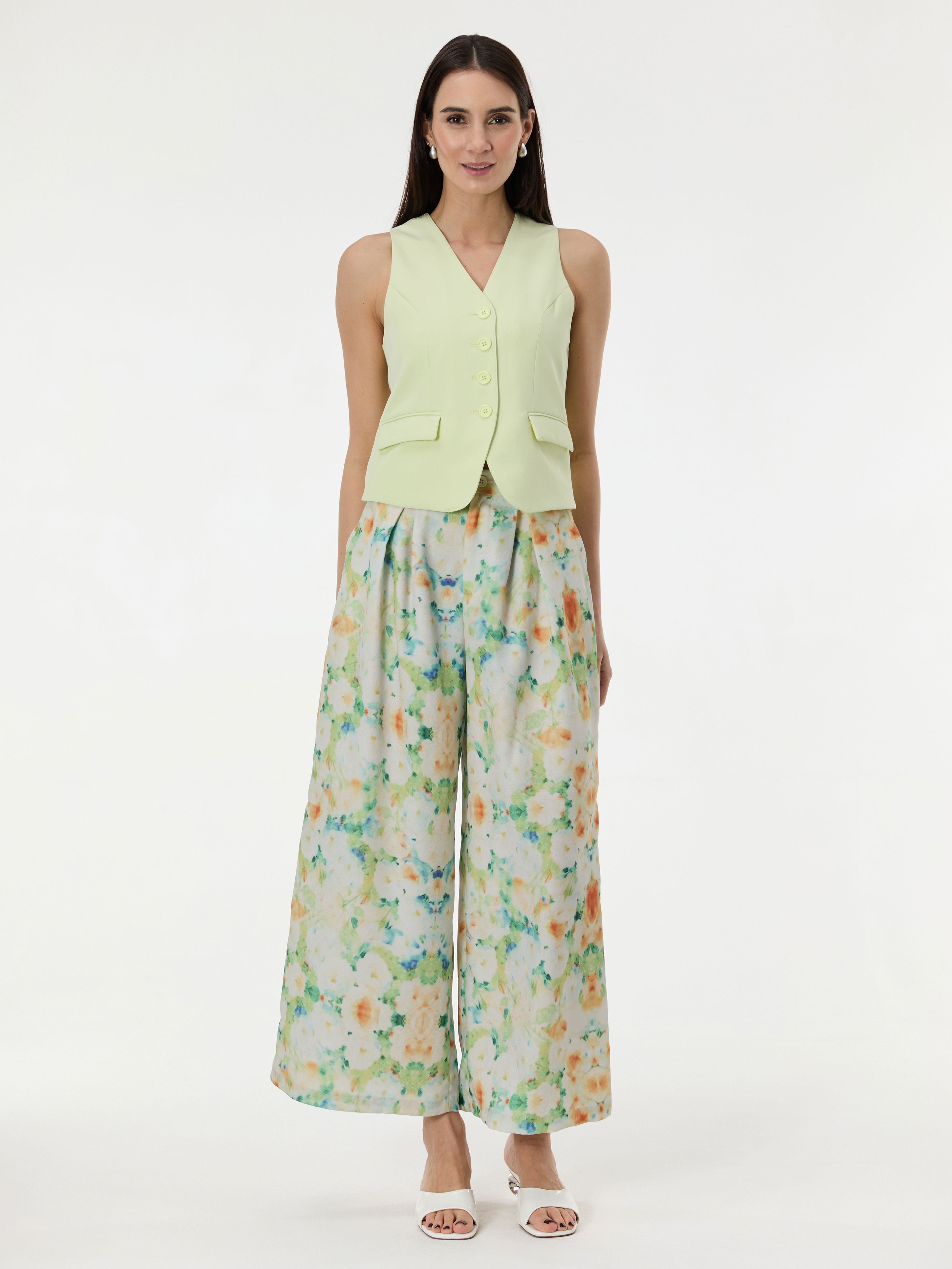 Jasnozielone damskie wzorzyste spodnie ORSAY