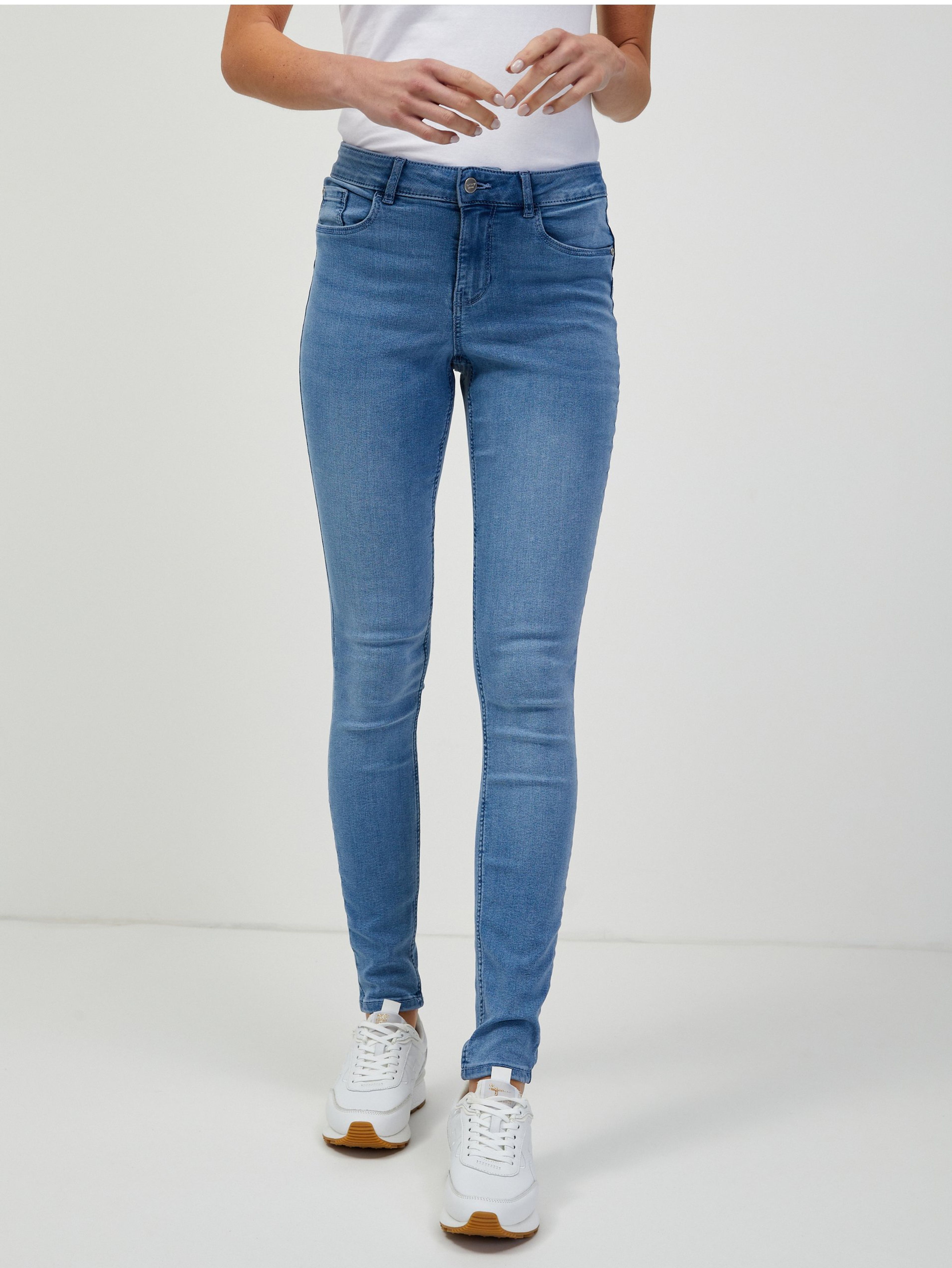 Jasnoniebieskie jeggings ORSAY